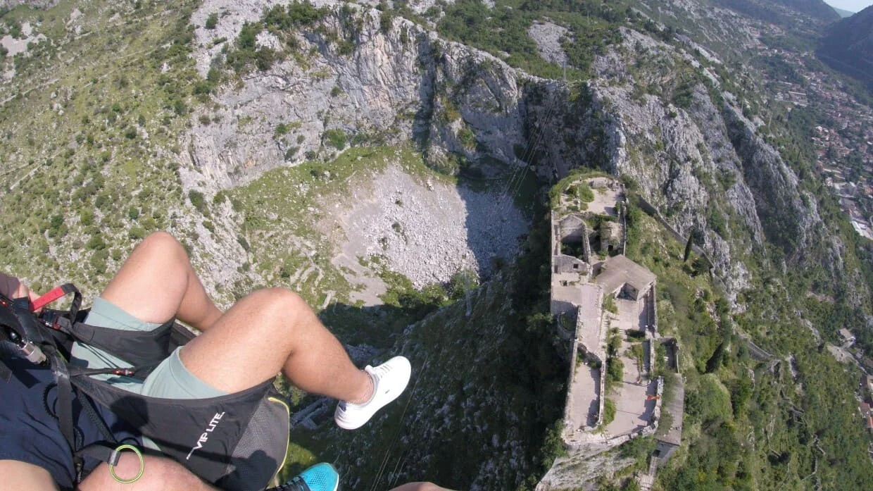 St John Fortress visible below a tandem paragliding route above Kotor.